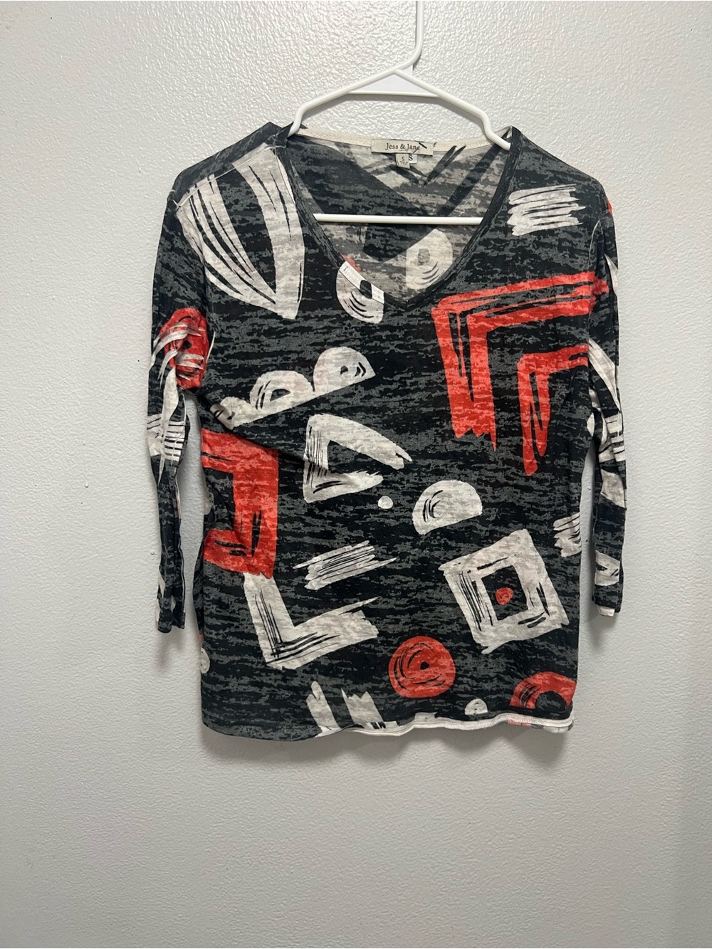 Jess & Jane Black Abstract Brushstroke V-Neck Art Top with Red Accents